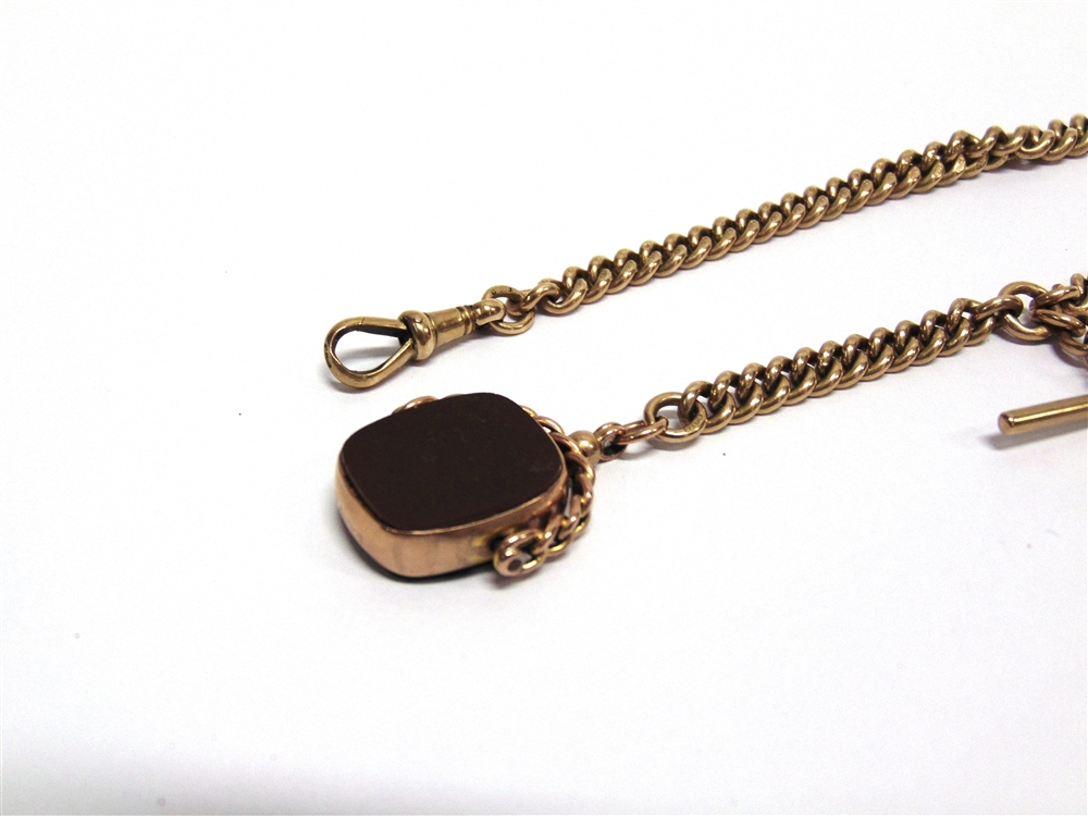A 9 CARAT GOLD WATCH CHAIN of solid graduated curb links, 32cm long, with T bar and swivel, also a - Image 2 of 2