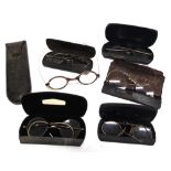 A PAIR OF SPECTACLES stamped '14K'; with five other metal spectacles, all in cases