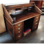 A TWIN PEDESTAL OAK DESK with fitted interior, 121cm wide 68cm deep 108cm high