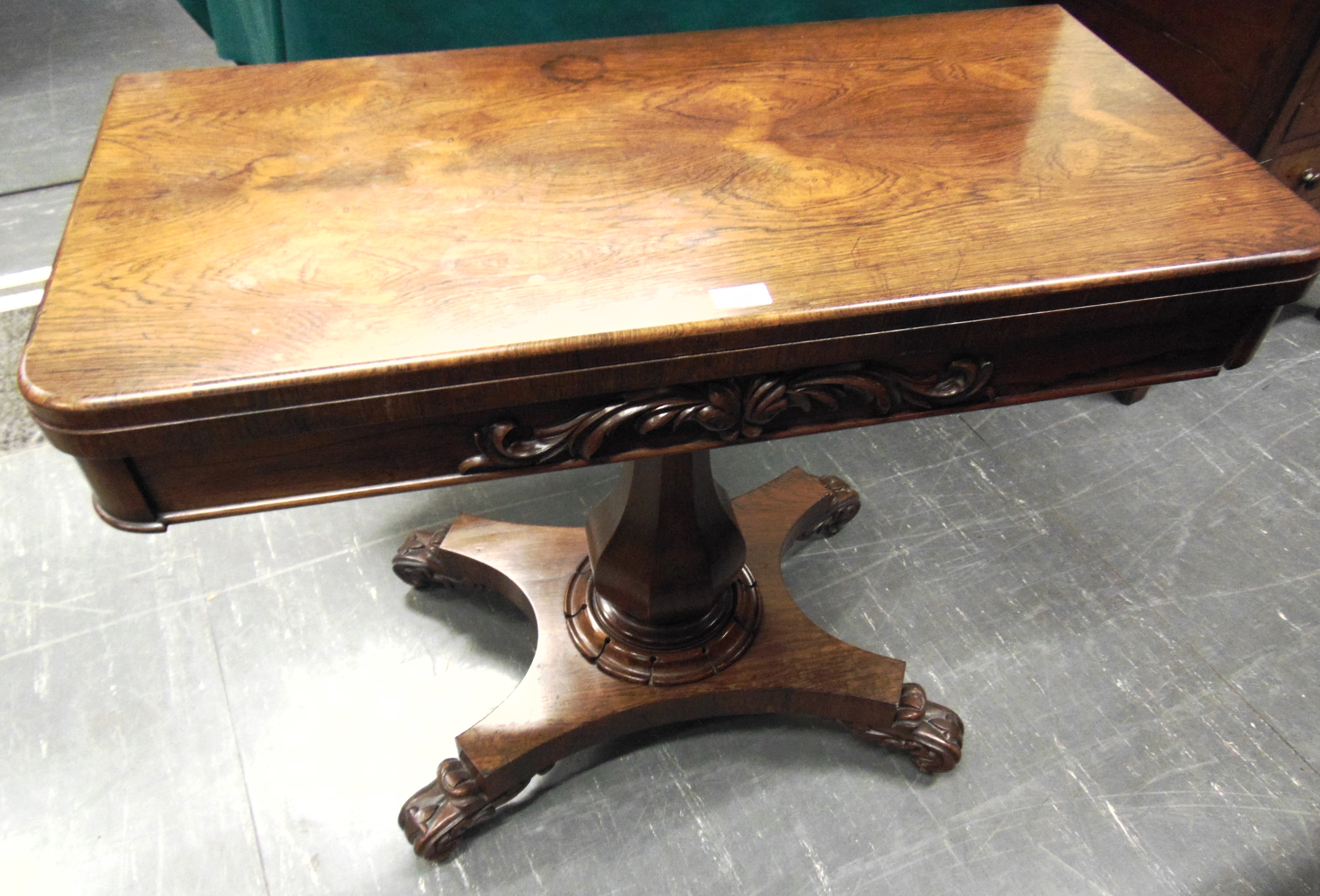 A WILLIAM IV ROSEWOOD CARD TABLE the frieze with carved decoration, on octagonal inverted baluster - Image 4 of 4