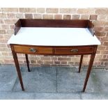 A BOW FRONT MAHOGANY WASHSTAND with marble top, 92cm wide 47cm deep 88cm high