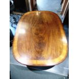 AN EARLY 19TH CENTURY TILT TOP MAHOGANY BREAKFAST TABLE the oblong top with satinwood inlay, the