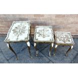 A NEST OF THREE COFFEE TABLES on cabriole supports, with painted and gilt decoration, the largest