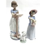 TWO LLADRO FIGURES: no. 6584 'Sunday Prayer' 25cm high and no. 6487 'New Shoes', together with a