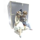 A LLADRO FIGURAL GROUP 'A POEM FOR MY GIRL/ UN POEMO PARA TI' no. 6821, modelled as a young couple