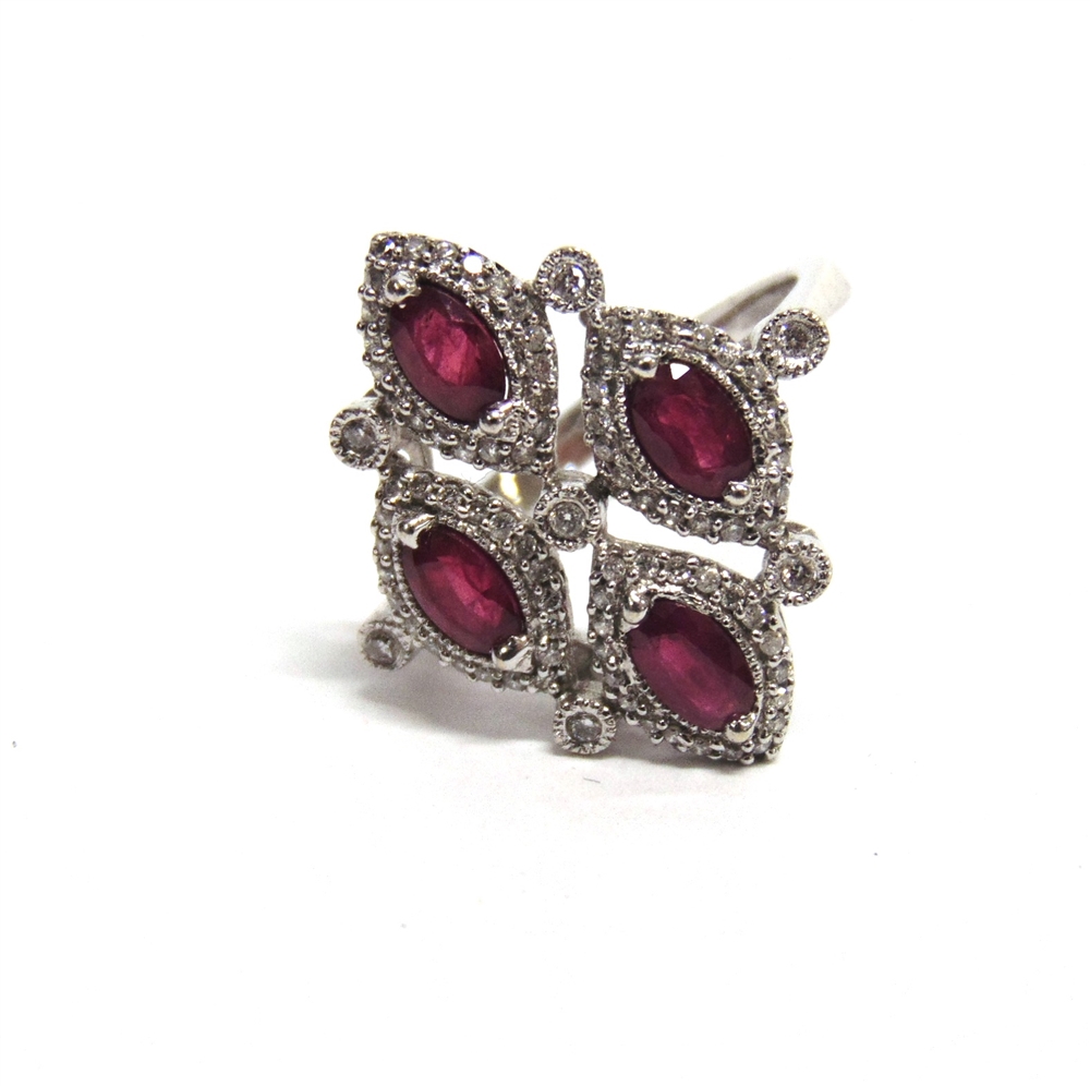 AN 18CT WHITE GOLD DRESS RING set with four oval rubies approximately 1.34ct in total and round - Image 2 of 6