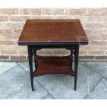 AN EDWARDIAN MAHOGANY SOLITAIRE CARD TABLE the hinged top revolving to reveal compartment beneath