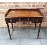 A 19TH CENTURY MAHOGANY WASHSTAND with three drawers on ring turned supports, 92cm wide 53cm deep