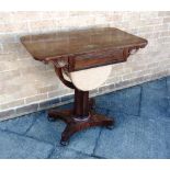 A WILLIAM IV ROSEWOOD SIDE TABLE fitted with drawer above sliding work bag, on octagonal pillar