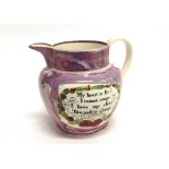 A SUNDERLAND PINK LUSTRE JUG one side decorated with a three masted shipo, the other side with the