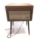 A DYNATRON FLOOR-STANDING RECORD PLAYER circa 1960s, with a Garrard turntable, 68.5cm high.