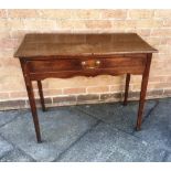 A GEORGE III OAK SIDE TABLE with single drawer to frieze on square tapering supports, 87cm wide 45cm