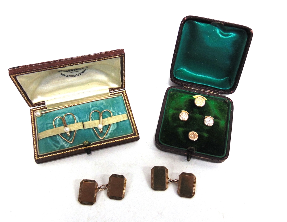 A PAIR OF 9 CARAT GOLD CUFFLINKS 1979; with a cased set of four 9 carat gold dress studs and