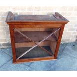 A MAHOGANY GLAZED HANGING WALL CABINET with moulded frieze above X-glazed door, 74cm wide 66cm