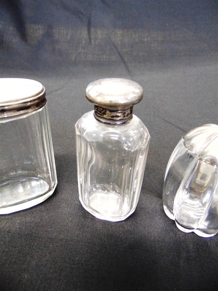 A LATE VICTORIAN SILVER MOUNTED GLASS SALT POT three silver mounted glass toilet bottles; and a - Image 2 of 2