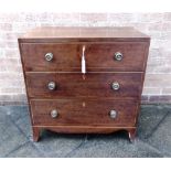 A MAHOGANY CHEST OF THREE LONG GRADUATED DRAWERS with boxwood edging, on shaped apron and splayed