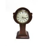 AN EDWARDIAN MAHOGANY BALLON CASED MANTLE CLOCK with inlaid decoration, 26cm high