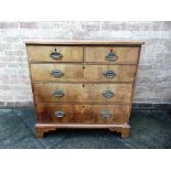 A GEORGE III OAK AND WALNUT CHEST OF TWO SHORT AND THREE LONG DRAWERS with line inlaid decoration,