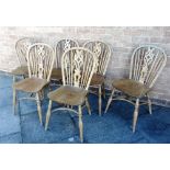 A SET OF SIX ASH & ELM WINDSOR STICKBACK CHAIRS with pierced splat backs and crinoline stretchers