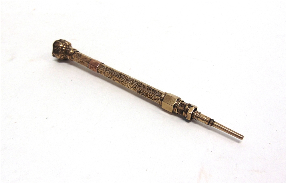 A LATE VICTORIAN SEAL END PROPELLING PENCIL stamped '9ct', with a crested bloodstone seal end