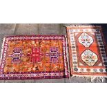 A KILIM RUG the central with three medallions and stylised animals, 108cm x 134cm; together with