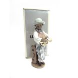 A LLADRO FIGURE 'JAZZ HORN/ TROMPSETISTA JAZZ' no. 5832, 22cm high, (with original box and