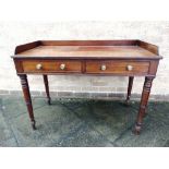 AN EARLY 19TH CENTURY MAHOGANY WASHSTAND the top with reeded edge and low three quarter gallery, two