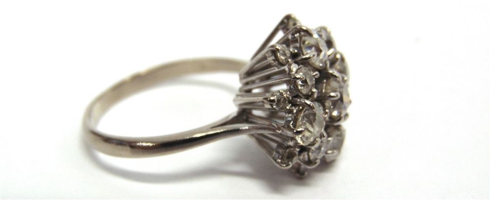 A SEVENTEEN STONE DIAMOND CLUSTER RING the yellow mount unmarked, the central diamond of - Image 4 of 5