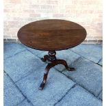 AN OAK TILT TOP TRIPOD OCCASIONAL TABLE the circular top 78cm diameter 70cm high