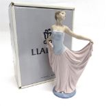 A LLADRO FIGURE 'THE DANCER/ DE ENSAYO' no. 5050, modelled as a posing lady dancer 31cm high, (