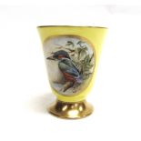 A PORCELAIN BEAKER WITH PAINTED ROUNDELS within gilt borders on a yellow ground, one side painted