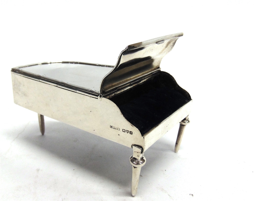 A NOVELTY SILVER TRINKET/RING BOX in the form of a piano, by Saunders & Shepherd, Chester 19 , the