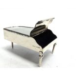 A NOVELTY SILVER TRINKET/RING BOX in the form of a piano, by Saunders & Shepherd, Chester 19 , the