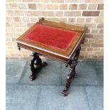 A REPRODUCTION MAHOGANY DAVENPORT TYPE DESK with brass three quarter gallery, red tooled leather