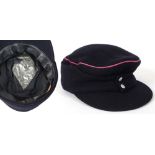 POLIZEI - AN M43 FIELD CAP of black wool / rayon construction, with rose pink (Rosa) waffenfarben to