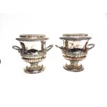 A PAIR OF ELECTROPLATED WINE COOLERS unmarked, with gadrooning, shell and acanthus band to the