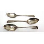 A GEORGIAN SILVER OLD ENGLISH PATTERN TABLESPOON by Eley, London 1803, monogrammed; another