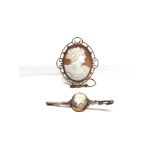 A LATE VICTORIAN SHELL CAMEO BROOCH the wire frame stamped '9ct', 5.3cm by 4.4cm; with a shell cameo