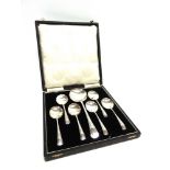 A CASED SET OF SIX SILVER ART DECO DESSERT SPOONS by W.H. Haesler, Birmingham, 1936, with matching