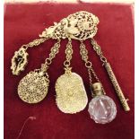 A GILT METAL CHATELAINE possibly French, now converted with a brooch fitting, the top piece with a