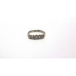 A FIVE STONE DIAMOND RING the graduated modern brilliant cuts totalling approximately 0.5 carats,