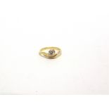 A DIAMOND SINGLE STONE 18 CARAT GOLD RING the brilliant cut of approximately 0.2 carats, finger size