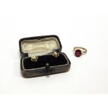 A 9 CARAT GOLD SYNTHETIC RUBY SINGLE STONE RING 2.3g gross; a pair of pearl dress studs, stamped '