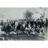 A PHOTOGRAPH OF THE END OF A TIGER HUNT with hunting party with three trophy tigers, 22.5cm x 32.