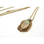 A WATER OPAL AND DIAMOND PENDANT the slightly asymmetrical cabochon, measuring approximately 19mm by