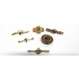 A VICTORIAN TURQUOISE SET BROOCH the flower head centre enclosed by engraved C scrolls, 2.9cm