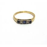 A FIVE STONE DIAMOND AND SAPPHIRE RING stamped '18ct Plat', the three square cut sapphires with a