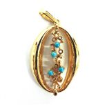 A 9 CARAT GOLD TURQUOISE SET PENDANT 6.9g gross