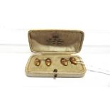 A PAIR OF SPLIT PEARL SET CUFFLINKS circa 1900, stamped '15ct', the four oval panels each star set