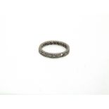 A DIAMOND FULL ETERNITY RING the white mount unmarked, with twenty two brilliant cuts totalling